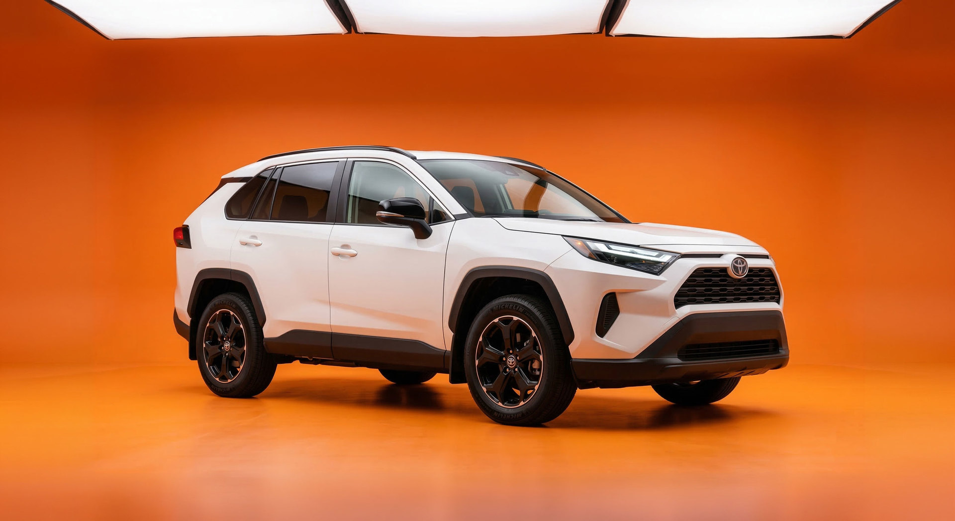https://x-assets.autorevo-powersites.com/content/assets/clients/6e372ff3-6c11-4ec9-a25a-3a8b71c6b708/hero_toyota_rav4_orange_2816
